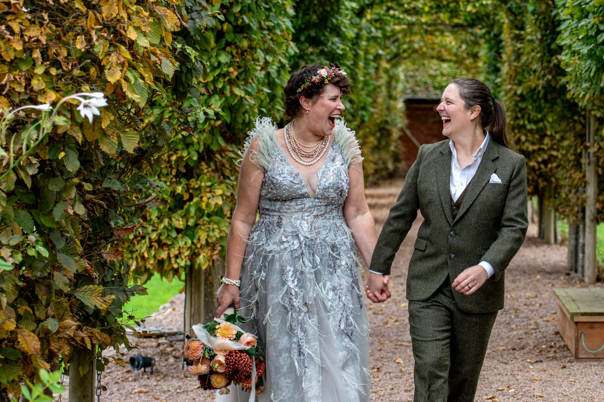 Bride and groom laughing together after wedding ceremony